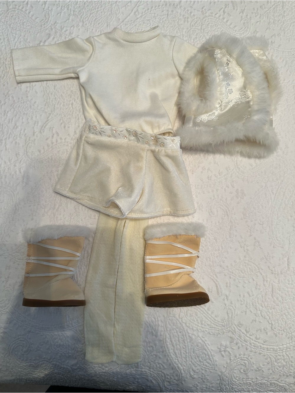 American girl doll, white top, pants, skirt, jacket, boots